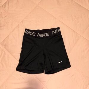 Nike Women's Black Athletic Shorts with Gray Logo